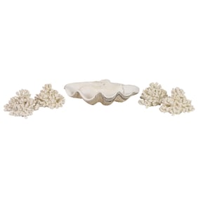 A set of four composite coral groups and a plaster giant clam shell