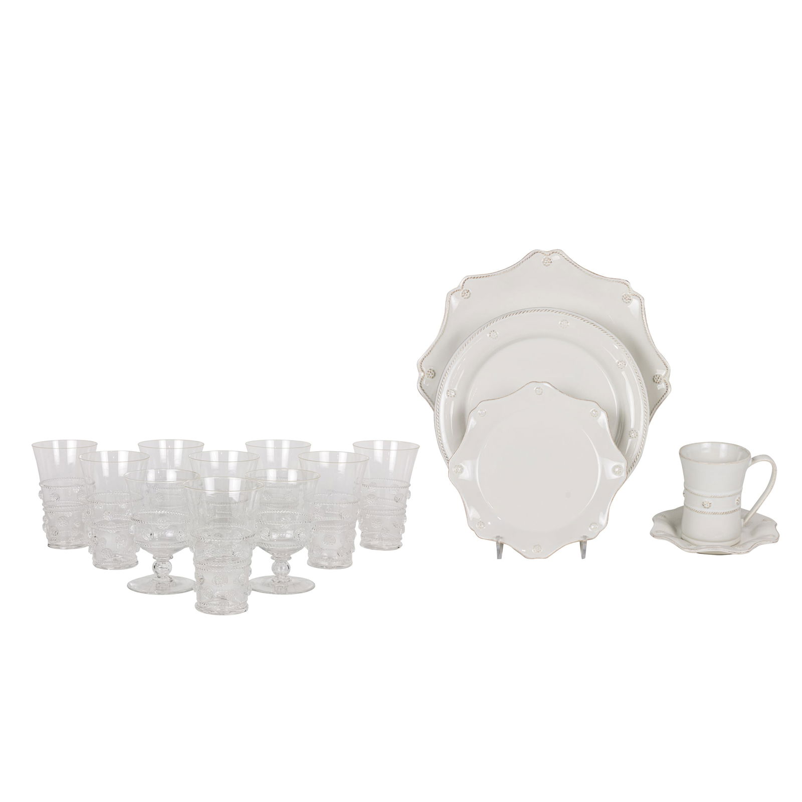 A Juliska Berry & Thread faience dinner service and Juliska Isabella glassware: A Juliska Berry & Thread faience dinner service and Juliska Isabella glassware, comprising (8) dinner plates, 11.25"dia; (16) scalloped luncheon plates, 9"w; (5) scalloped salad plates, 7"w; (2) scall