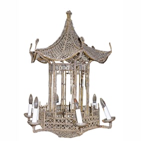 A French glass bead and gilt iron pagoda form six light chandelier in the manner of Maison Bagues
