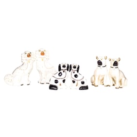 Three pairs of Staffordshire and Staffordshire style dogs