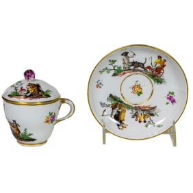 A Meissen porcelain covered cup and saucer