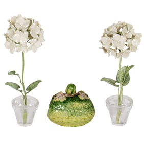 A Vladimir ceramic covered melon box with a pair of porcelain hygrangeas in pots