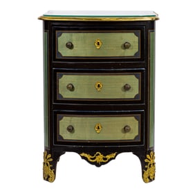 A French gilt bronze mounted and marquetry inlaid three drawer side cabinet