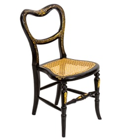 A Victorian ebonized and shell inlaid child's chair