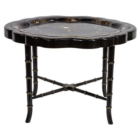 A papier mache tray on stand