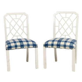 A pair of contemporary white lacquer side chairs