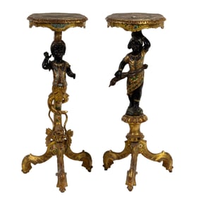 A pair of Venetian partial gilt and polychrome blackamoor pedestals