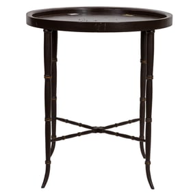 A large papier mache circular tray table