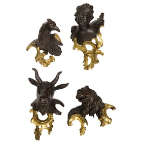 A group of four Venetian Rococo painted and parcel gilt busts