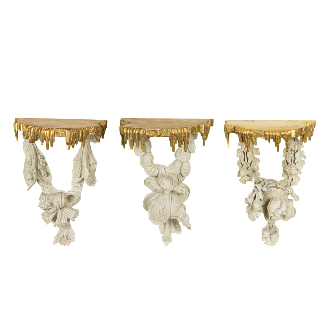 A set of three Regency style painted and parcel gilt wall brackets (1 of 4)