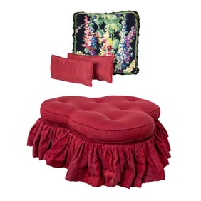 A tufted pouf or ottoman