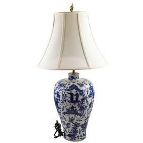 An Asian style blue and white vase form ceramic lamp