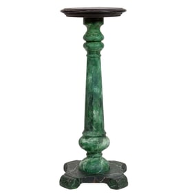 A faux marbleized pedestal