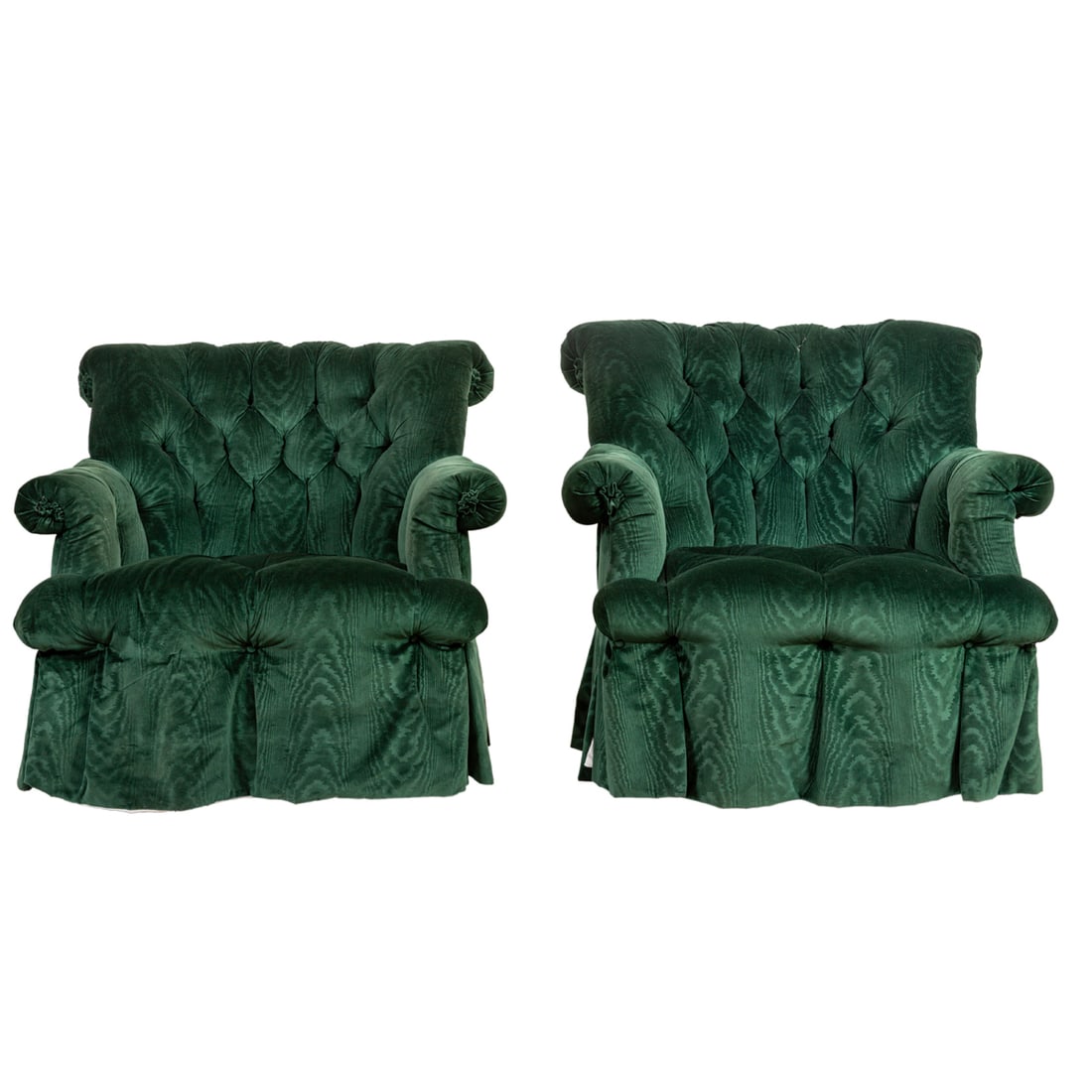 A pair of deep green tufted rocker armchairs: A pair of deep green tufted rocker armchairs, each upholstered in a faux malachite cut velvet, 32"h x 24"w; seat 16"h. Provenance: The Carole Harris Collection, River Ranch. The interiors guided by Pa