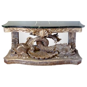 An impressive silvered wood console table in the Italian Baroque taste, the serpentine marble top,
