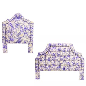 Two headboards and various bedding in a purple Chinoiserie toile