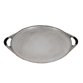 A Georg Jensen sterling tray with ebony handles