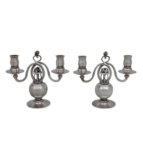 A pair of Georg Jensen sterling two light candelabra