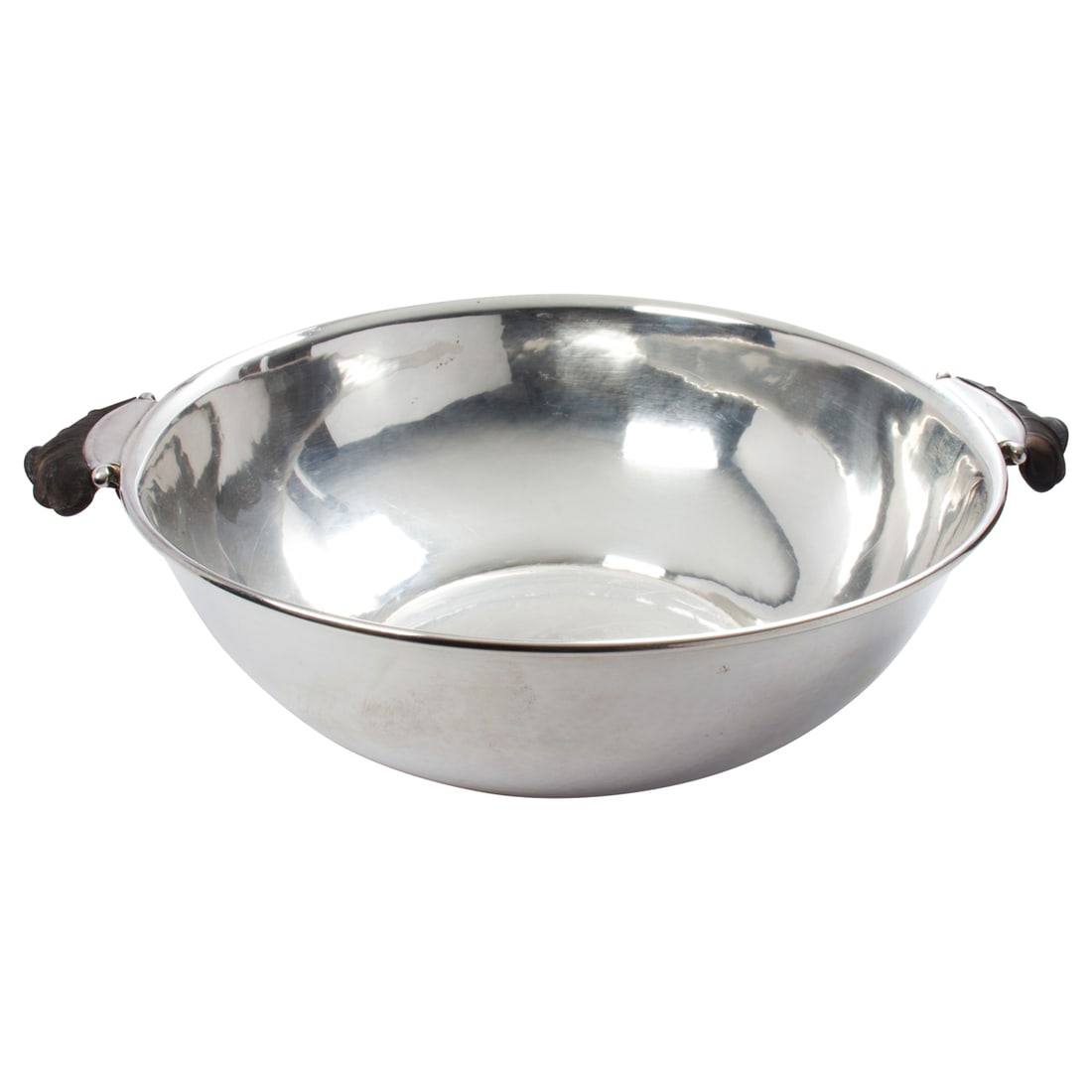 A George Jensen sterling bowl with ebony handles: A George Jensen sterling bowl with ebony handles, #439, designed by Harald Nielsen, likely lacking cover, the bowl flanked by silver pads and wood foliate handles,11.5"dia including handles, 9"dia exc