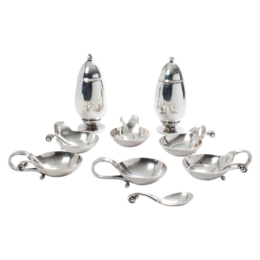 A set of six Georg Jensen sterling salt cellars and spoons,#110; with (1) pair of salt and pepper (1 of 3)
