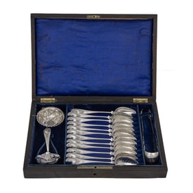 A cased Belgian sterling tea flatware and accessory set