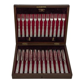 A Walker and Hall sterling and mother of pearl handled fruit service for twelve in a fitted case