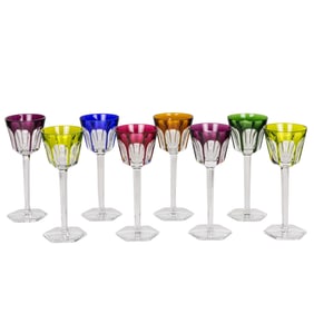 A harlequin set of eight Baccarat cut glass hoch wine glasses in the Versailles pattern