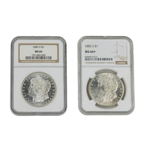 Two U.S. Morgan silver dollars