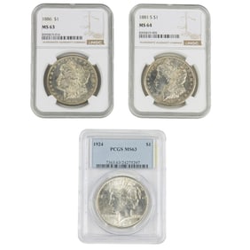 Three U.S. silver dollars