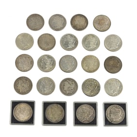 Twenty-three U.S. Morgan and Peace silver dollars