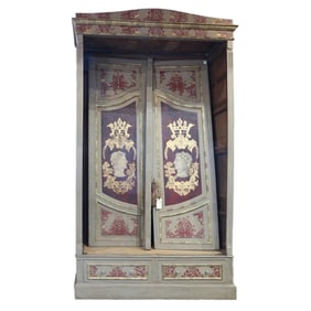 A monumental Neoclassical style armoire