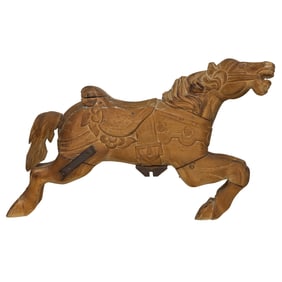 A carved wood carousel horse
