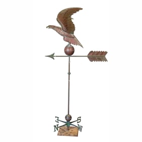 A copper full bodied eagle weather vane
