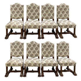 A suite of eight Victorian carved walnut dining chairs