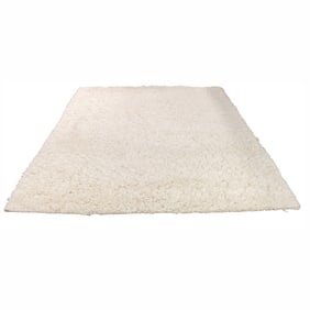 A modern cream shag carpet