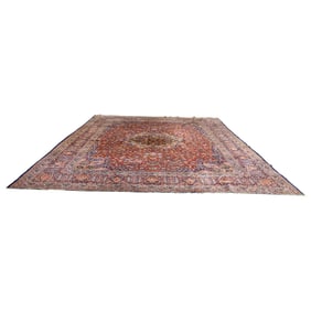 An antique Persian Kashan carpet