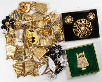 Thirty-three pieces of Avon costume jewelry comprising brooches in flora and fauna forms, including