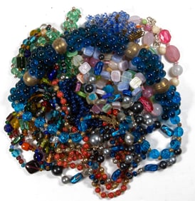 Ten costume jewelry necklaces, one with matching earrings