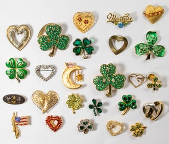 Twenty-five Holiday themed costume jewelry brooches including 4th of July, St. Patricks Day,