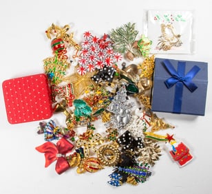 Forty-eight costume jewelry brooches with Christmas/Winter theme