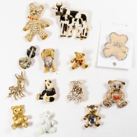 Thirteen costume jewelry brooches of teddy bears and various animals
