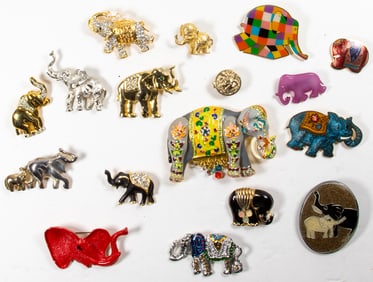 Seventeen costume jewelry brooches of elephants