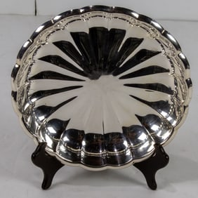 A Reed and Barton silverplate footed bowl with scalloped rim