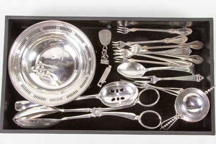 A group of sterling and silverplate flatware serving pieces and others