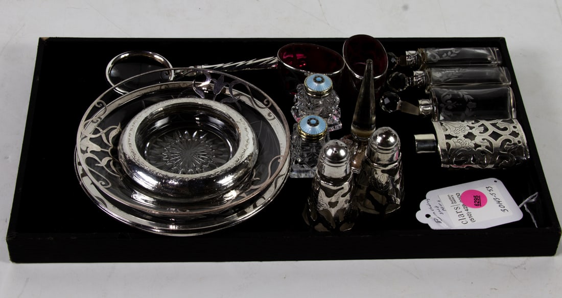 A group of twelve silver mounted glass and champleve table articles comprising dressing table (1 of 1)