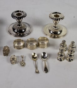 Sixteen pieces of sterling table articles