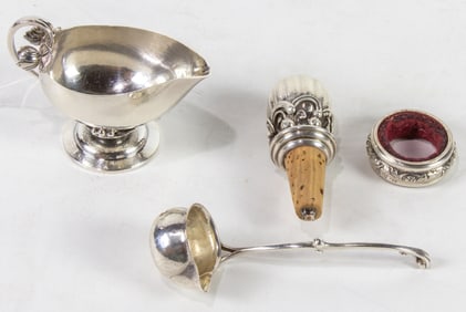 A collection of Georg Jensen sterling articles comprising (1) miniature creamer