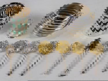 A nine-piece collection of sterling and silverplate, including Hermes, and Tiffany