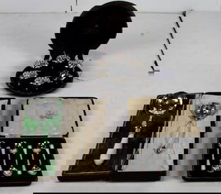Three cased sets of sterling table articles comprising diminutive spoons, open salts and slotted