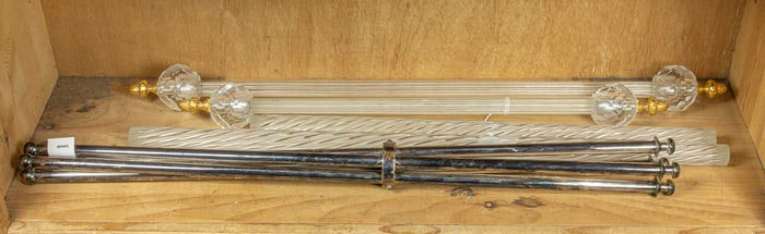 A folding silver plated stand and a four glass fluted rods possibly originally towel rods